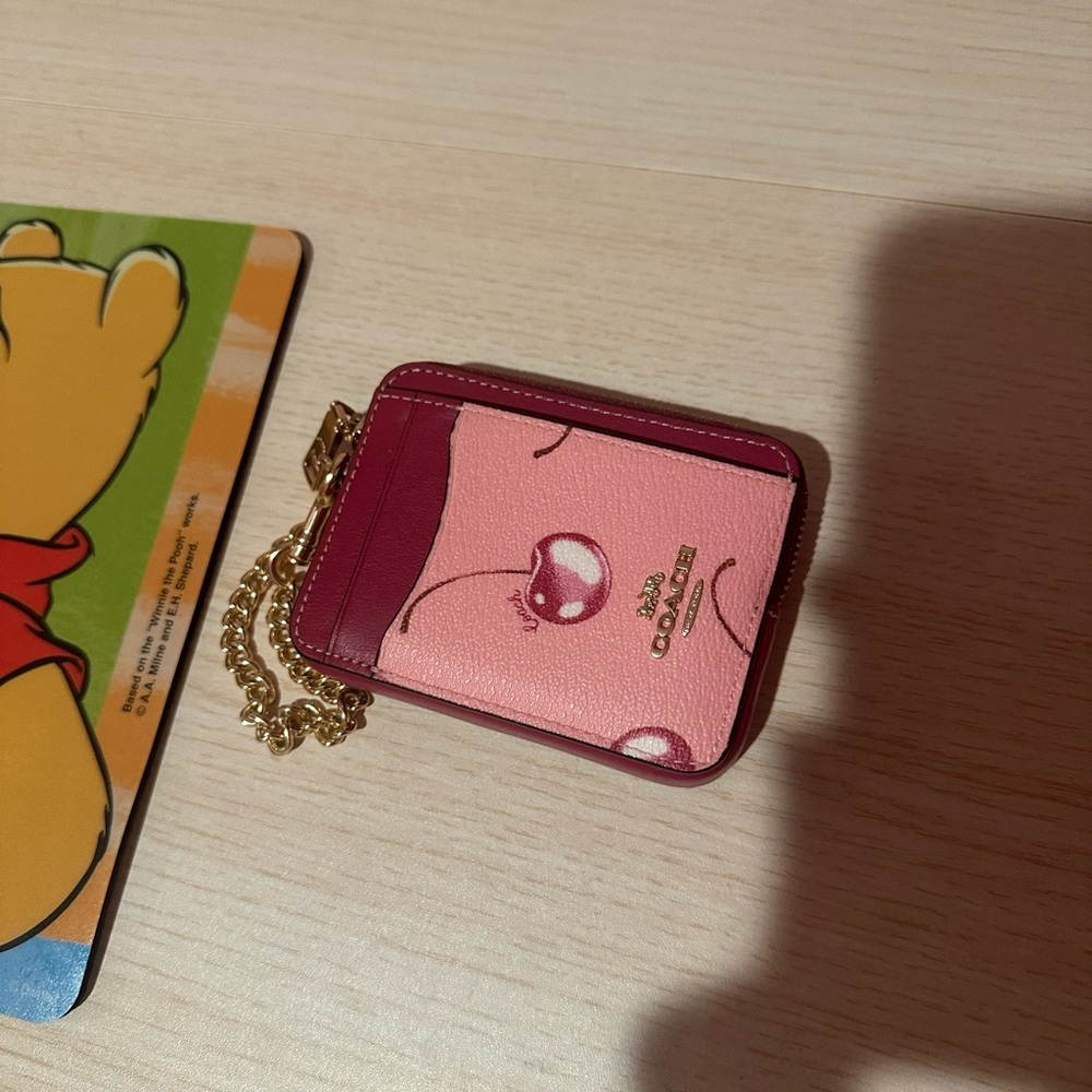 Coach Pink cherry print zip card